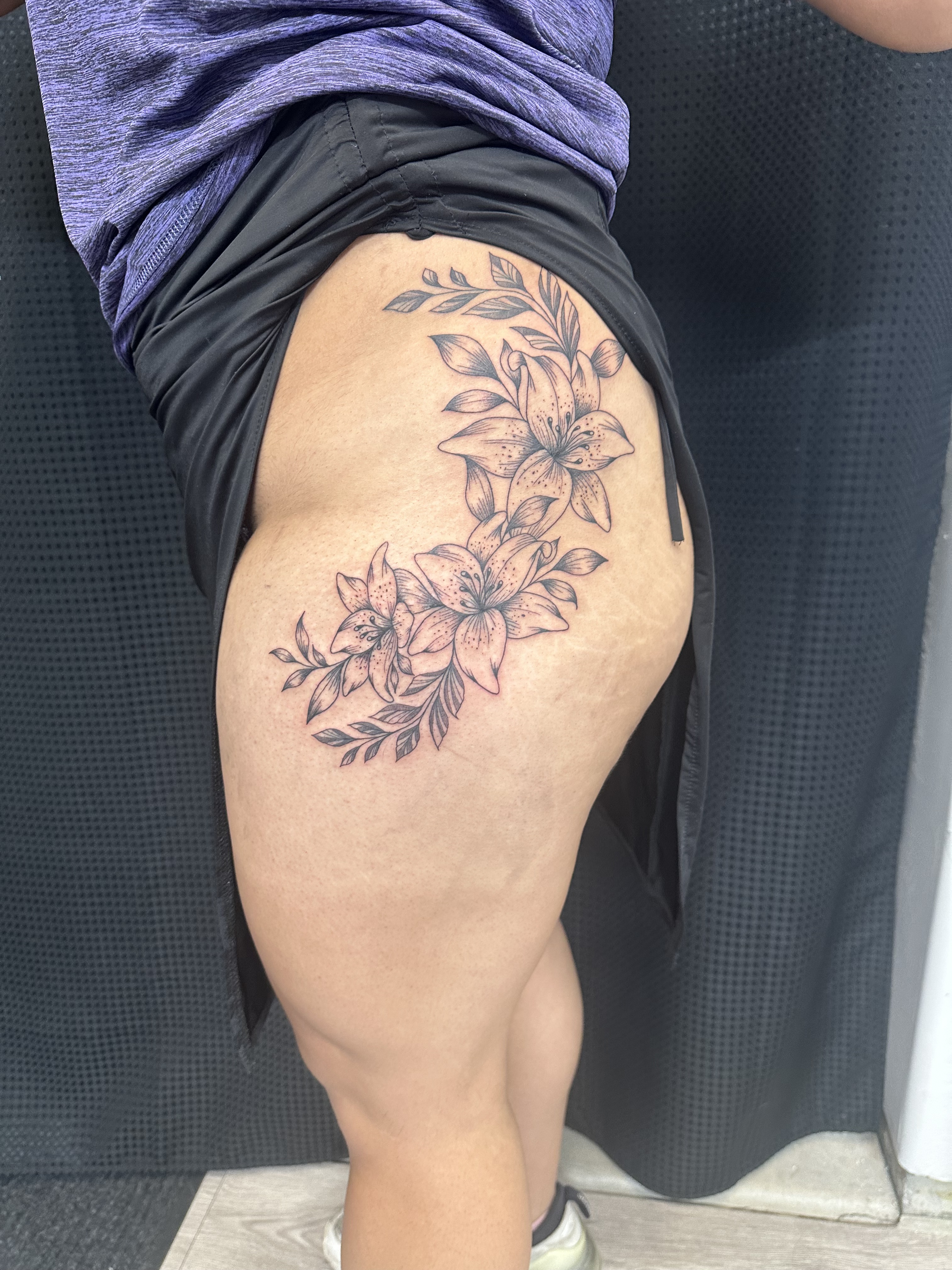 Floral hip tattoo